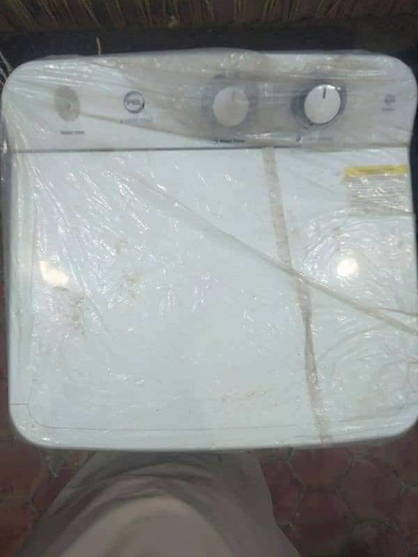 Pel washing machine with three years worenty in white color 2