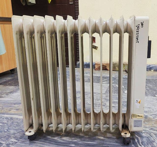 Dinlongi Oil filled heater 12 fins 1