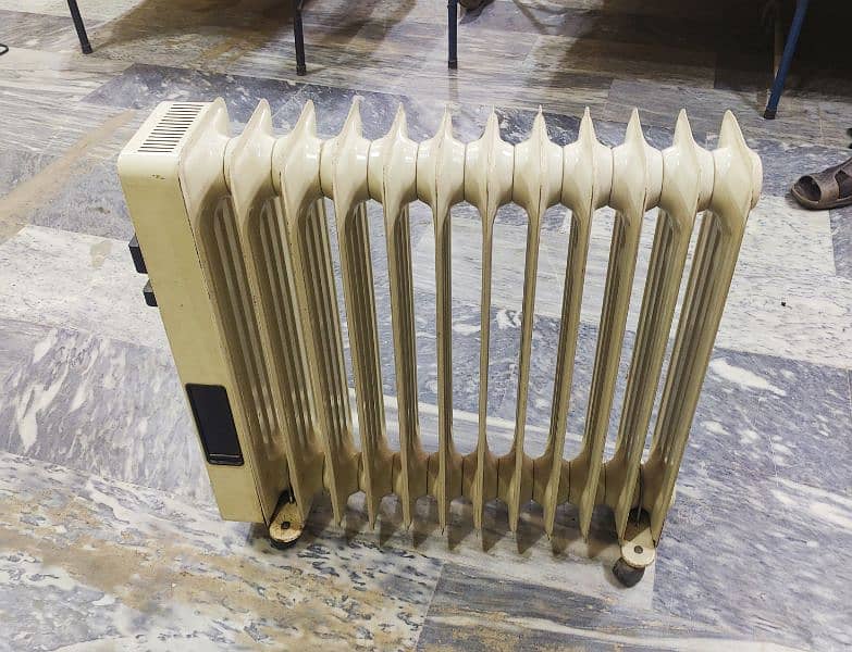 Dinlongi Oil filled heater 12 fins 3