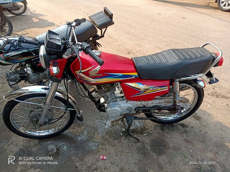 Honda 125 2019 ka end Karachi number 0/3/1/2/2/4/5/9/4/5/0 1