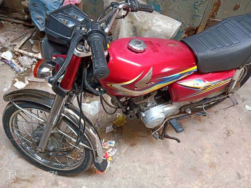 Honda 125 2019 ka end Karachi number 0/3/1/2/2/4/5/9/4/5/0 7