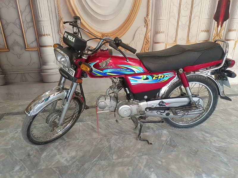 Honda CD 70 2024 5