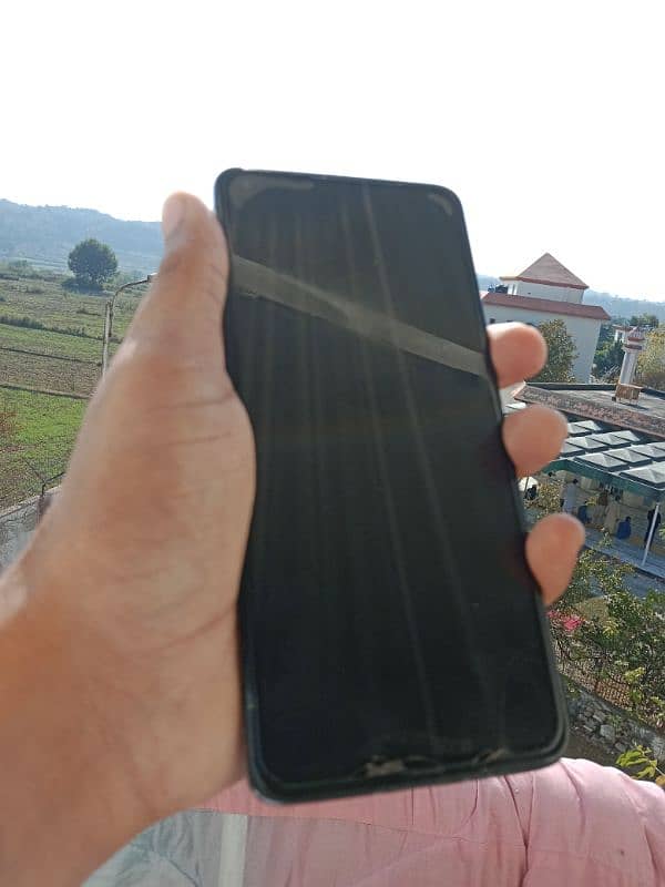 One plus 8t approved  back break. front cam ka sath dot ha 2