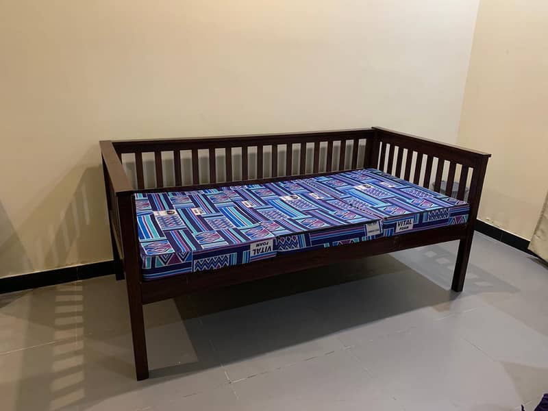 Solid wooden single bed is for sale 1