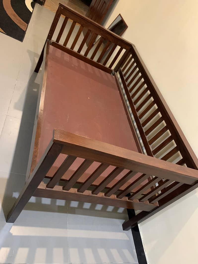 Solid wooden single bed is for sale 2