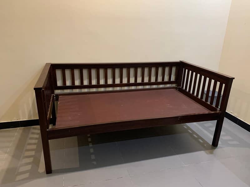 Solid wooden single bed is for sale 6