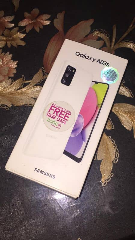 Samsung a03s with original box and charger 1