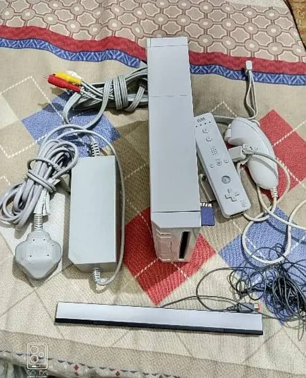 wii gaming console with accessories 0