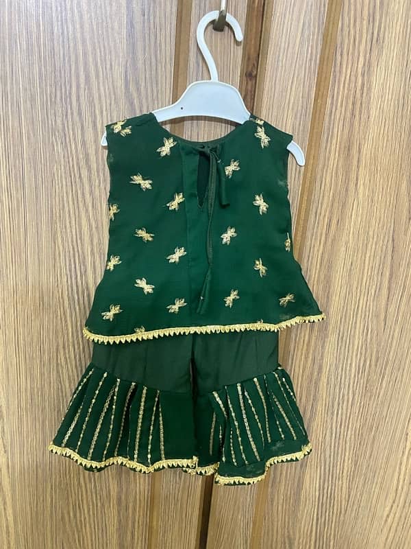 fancy 6 to 9 month baby girl garara wite sleeveless shirt bottle green 1