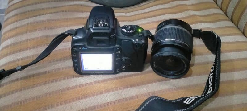 canon. 400D with 18.55 lens 5