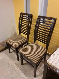 2 Brown Heavy Wood Chairs