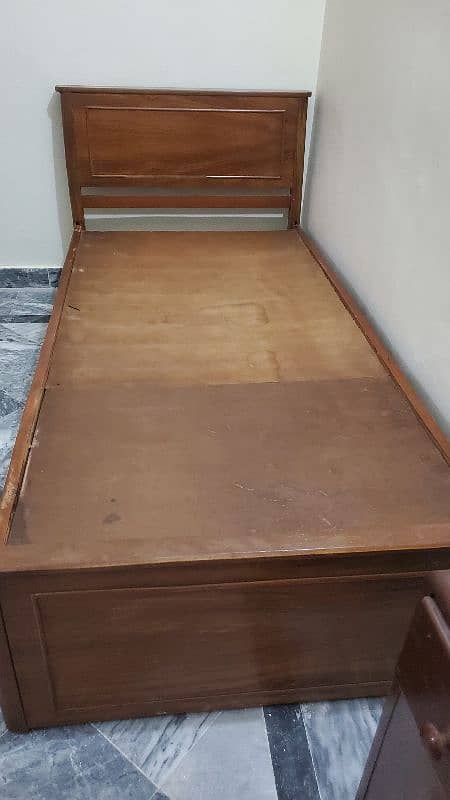 single wooden bed 0