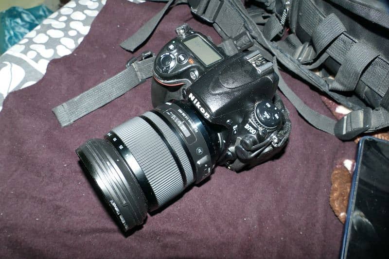 Nikon D700 camera And.   Sigma Art lens 24-105 3