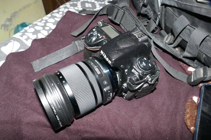 Nikon D700 camera And.   Sigma Art lens 24-105 10