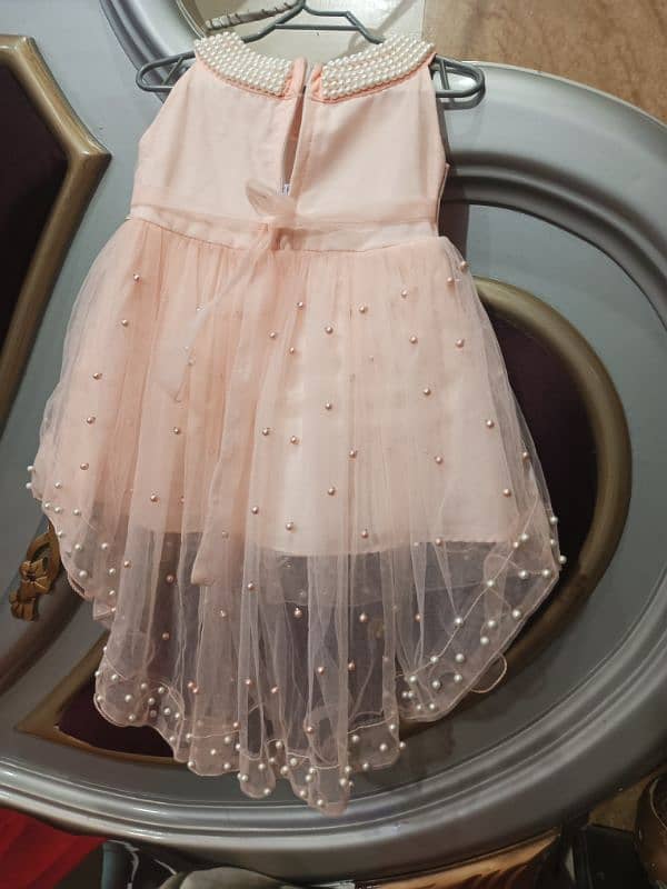 1 SE 2 year baby dress good quality good condition two time use 6