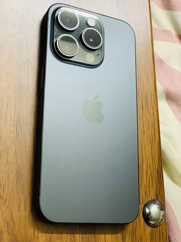 Iphone 15pro natural black taitanium 6