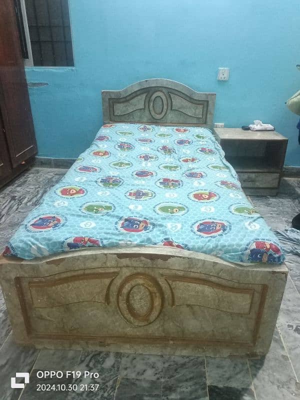 single bed and side table with mattress 0