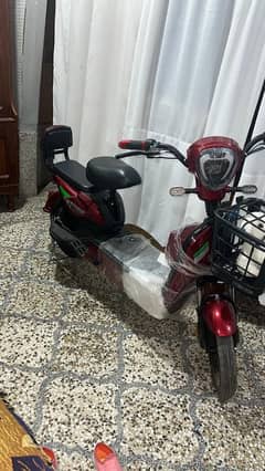 Scooty for sale and house