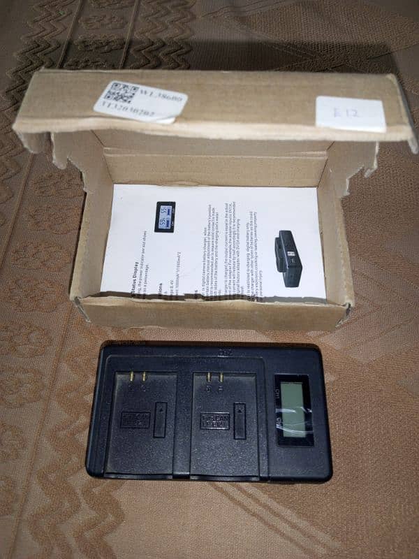 canon M 50   LP E-12 BATTERY CHARGER WITH POWER BANK 0