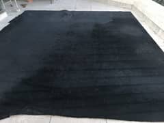 Black woolen carpet