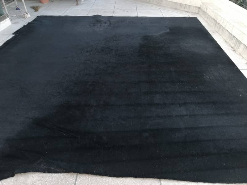 Black woolen carpet 0