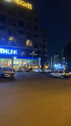 Rented shop attached with brand per month incoming rent 110000 in civic center phase4 bahria town rwp