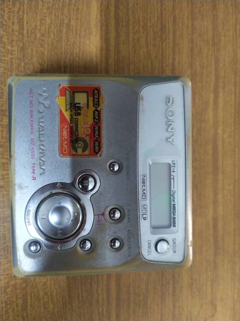 Sony  Walkman and 2 mini disc 0