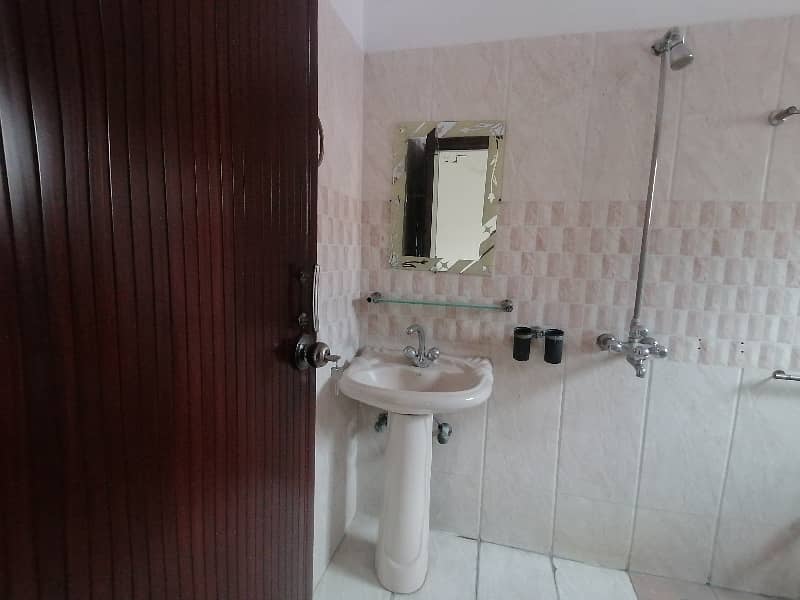 Lower Portion Sized 10 Marla Is Available For rent In Marghzar Officers Colony 13