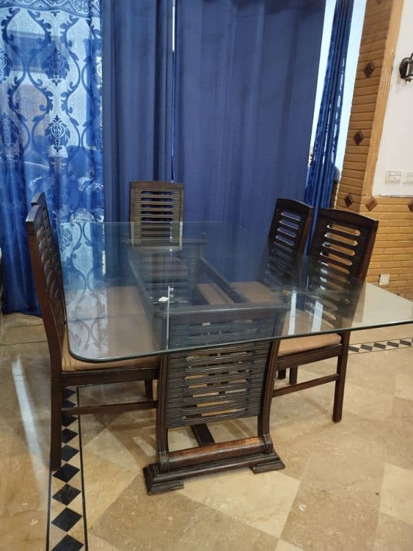 Wooden Dining Table glass top with 6 chairs , 4