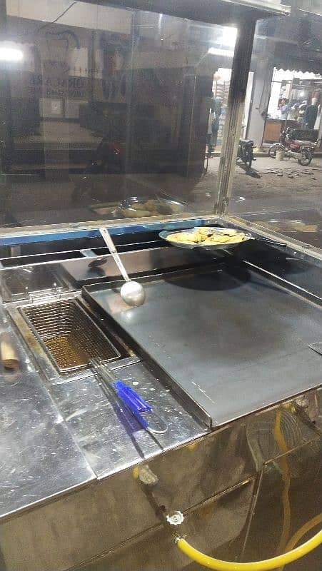 burger counter with fryer ( steel main hai with  trolly wheel 2