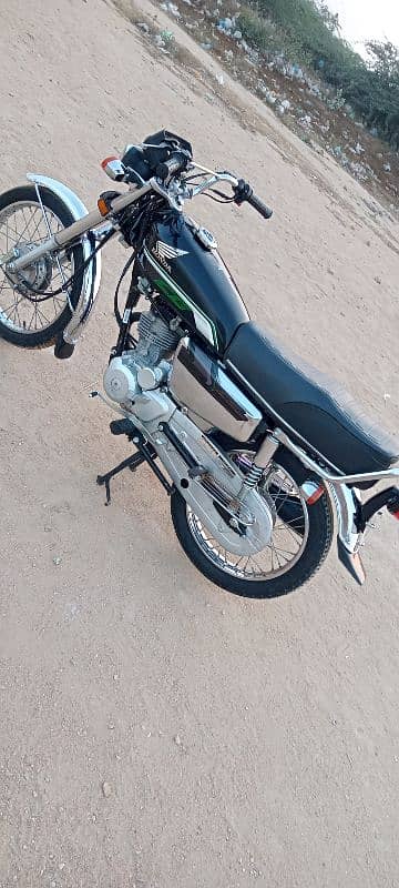 Honda 125 Model 2023 Karachi number 0312/24/92/688 7