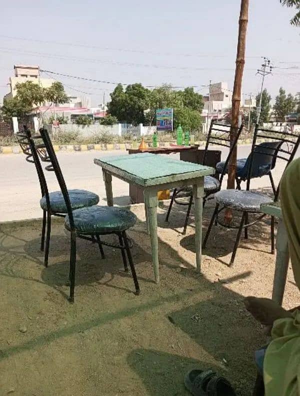 3 wooden table 6 iron chairs beach Rana noon condition 10/8  he 0