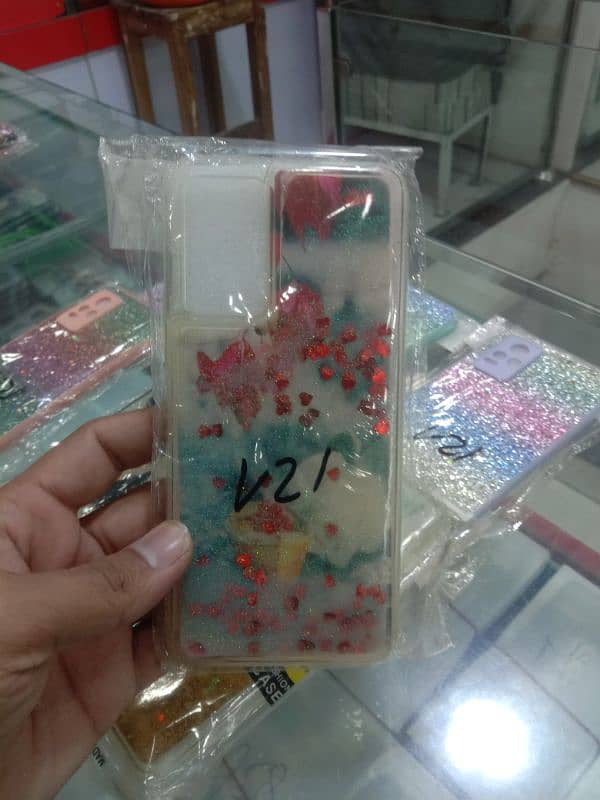 Vivo v21E hello kitty pouch available good price Lahore qanchi stop 5