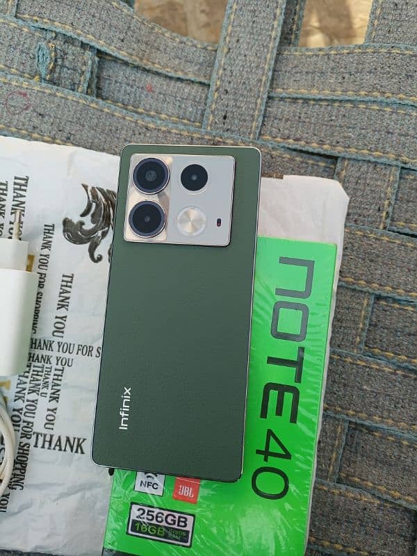 infinix note 40 original charger & box no open no repair. 9