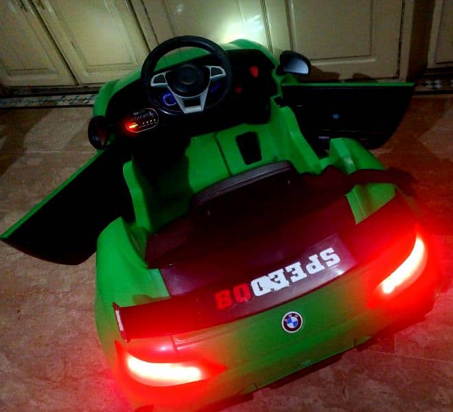 kids BMW car 10/10 condition like new with remotecontrol or swing mode 7