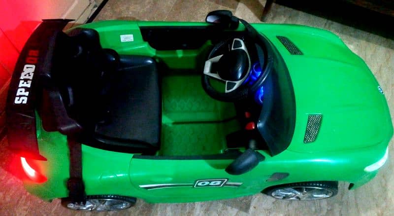 kids BMW car 10/10 condition like new with remotecontrol or swing mode 10