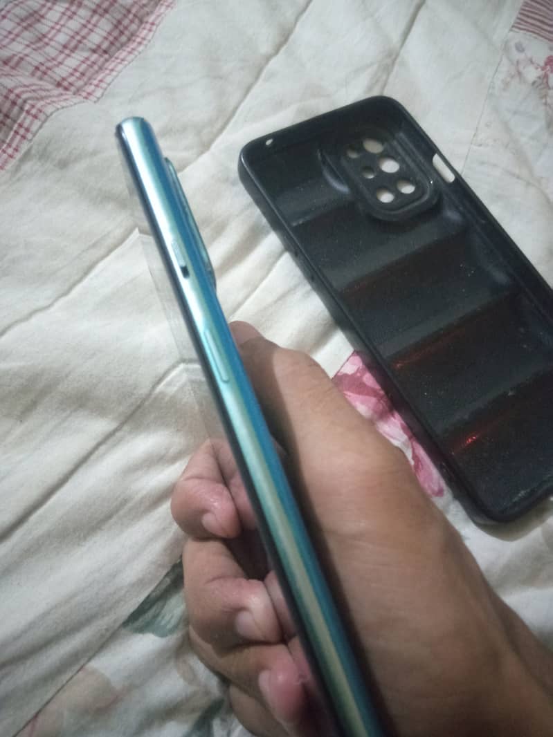 one plus 8t 12/256 with charger and back cover 2