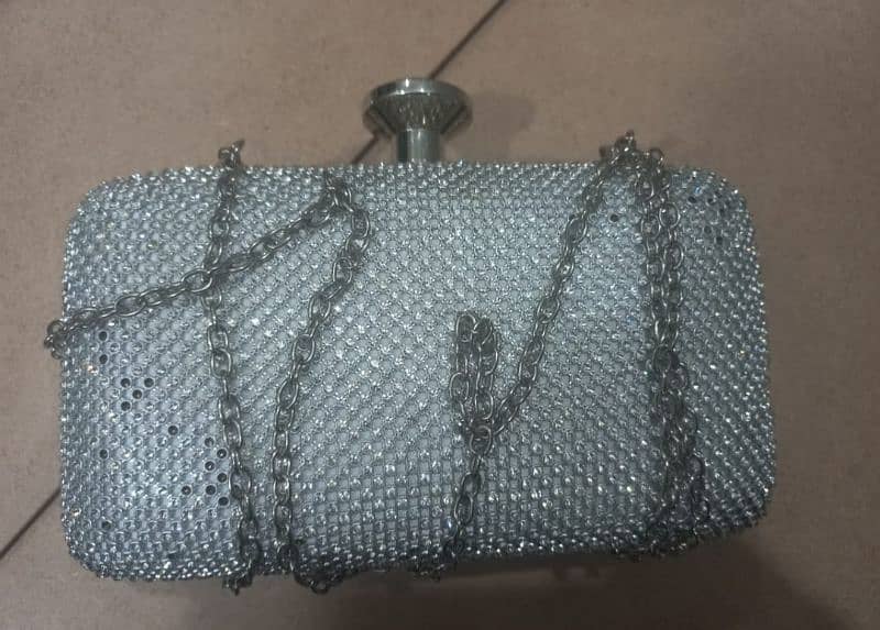 A silver Clutch for sale 1