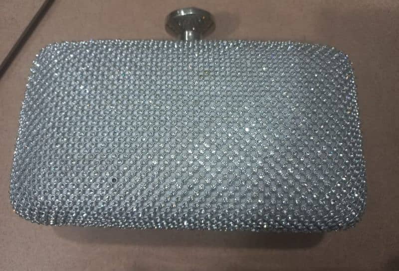 A silver Clutch for sale 2