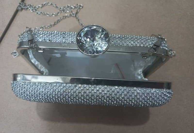 A silver Clutch for sale 4