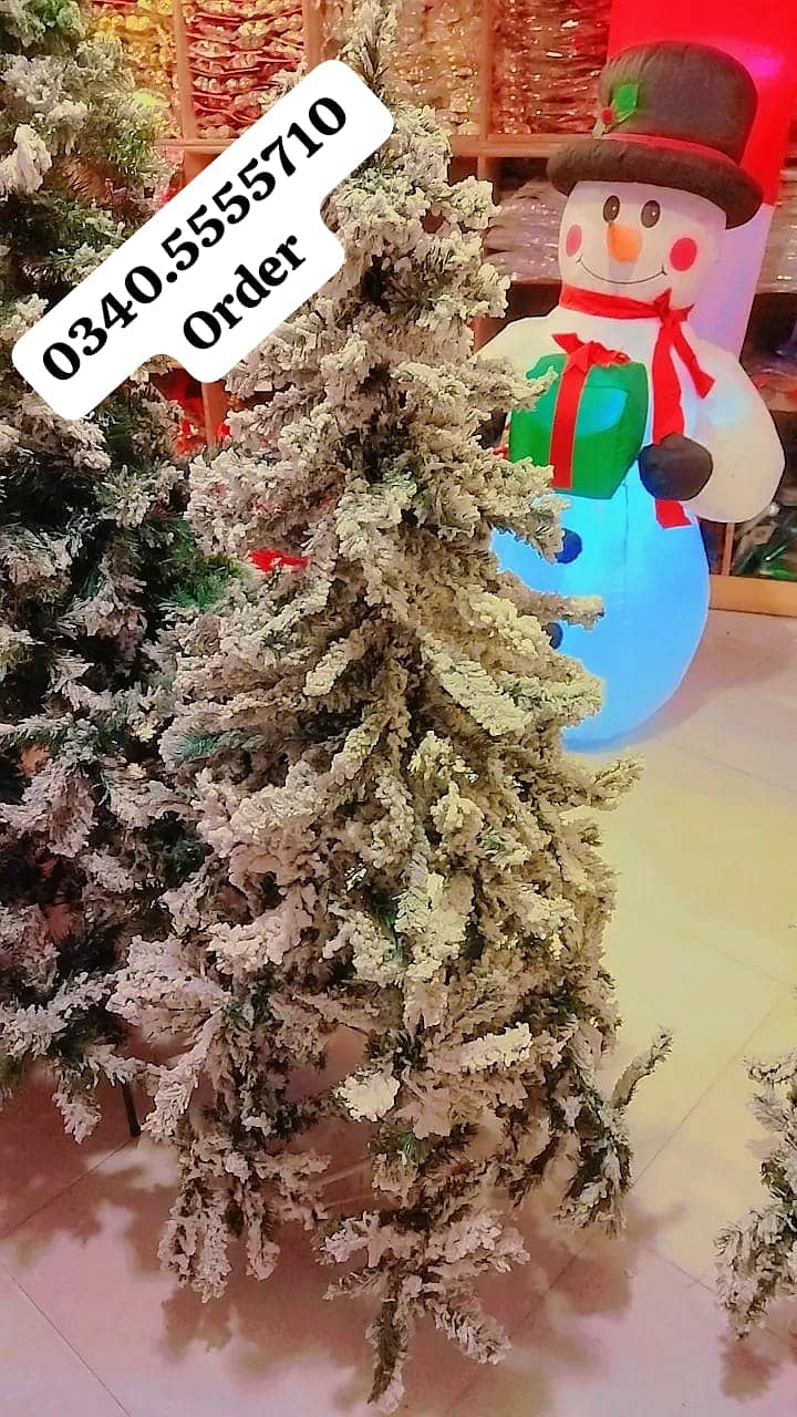 Thick Christmas tree & decorations available contact O340/55-55- 1