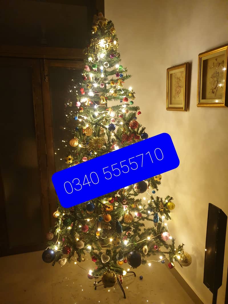 Thick Christmas tree & decorations available contact O340/55-55- 3