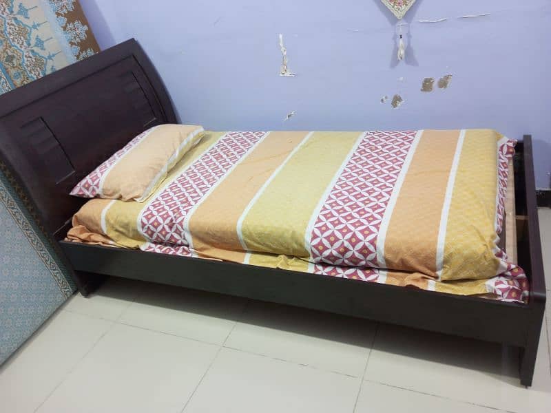 A leminated like new single bed with matress 1