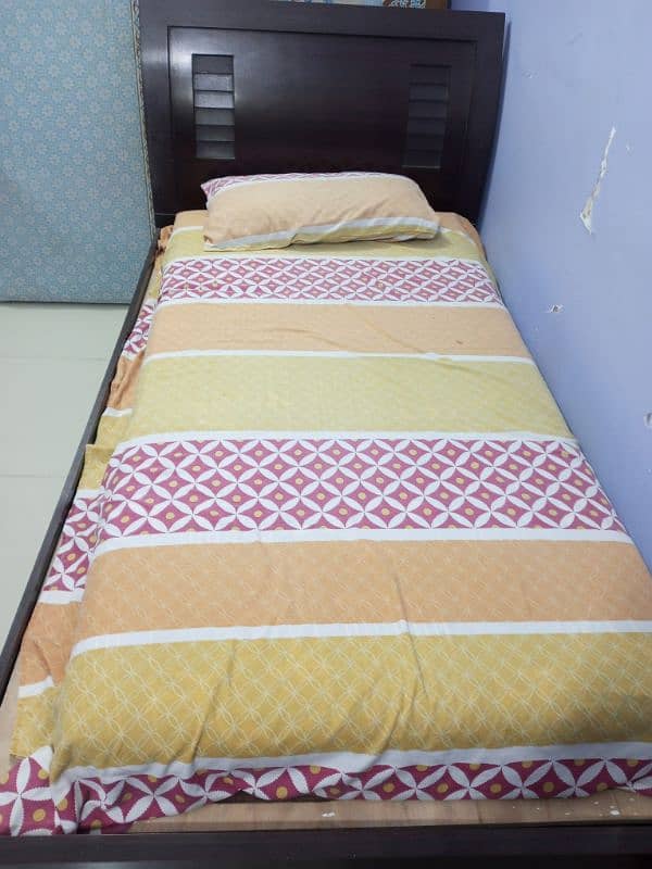 A leminated like new single bed with matress 2