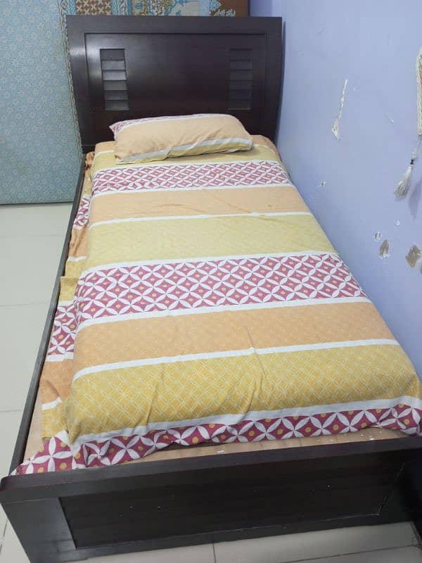 A leminated like new single bed with matress 3