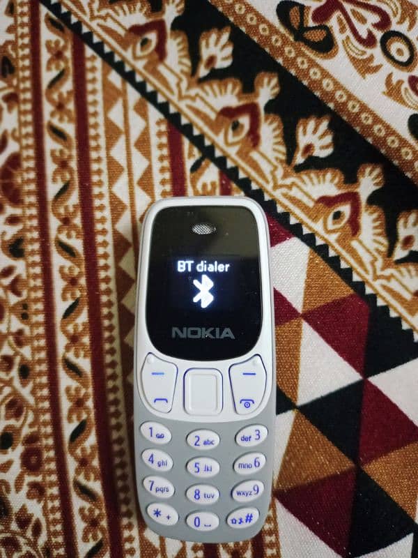 Nokia mini pta 3310 . Finger size Nokia  delivery available 1