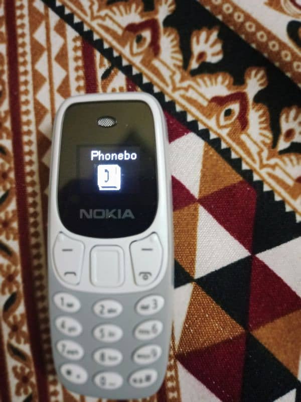 Nokia mini pta 3310 . Finger size Nokia  delivery available 2