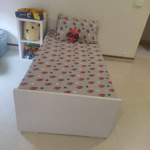 2 single kids size beds in white colour 4