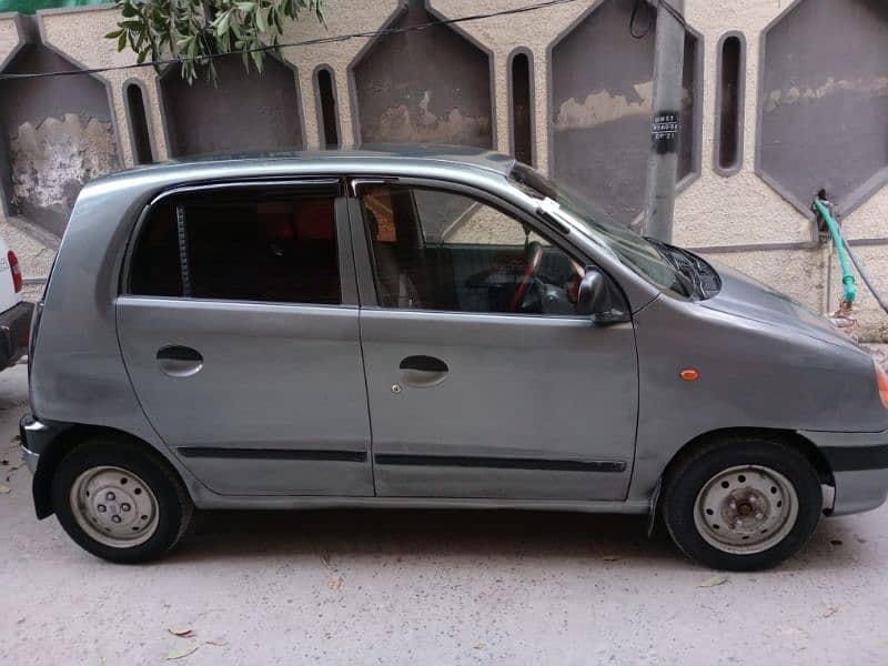 Hyundai Santro 2004,Non accidental guaranteed AC chill 9