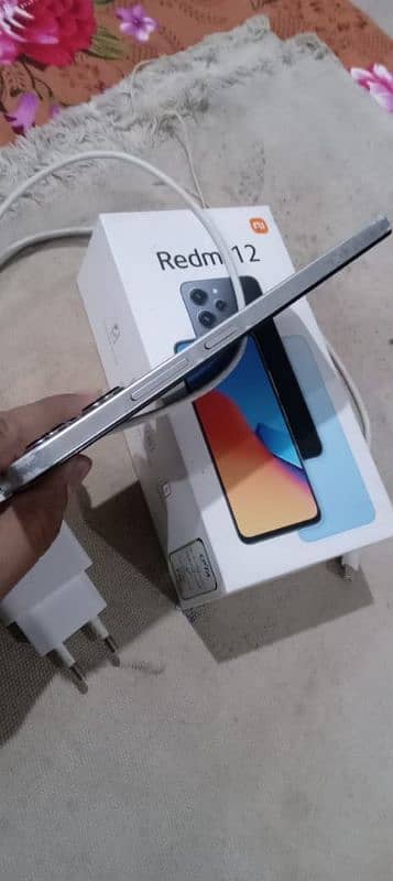 Redmi 12 8+4,128gb ful box original charger best camera All ok No Open 7